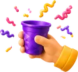 Hand met een feestbeker en confetti